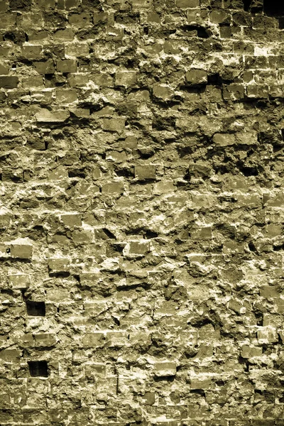 Antiguo fondo grueso de una textura de pared de ladrillo — Foto de Stock