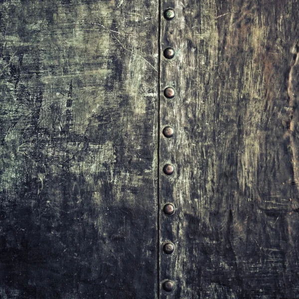Perçinli Grunge siyah metal plakası arka plan dokusunu vidalıyor — Stok fotoğraf