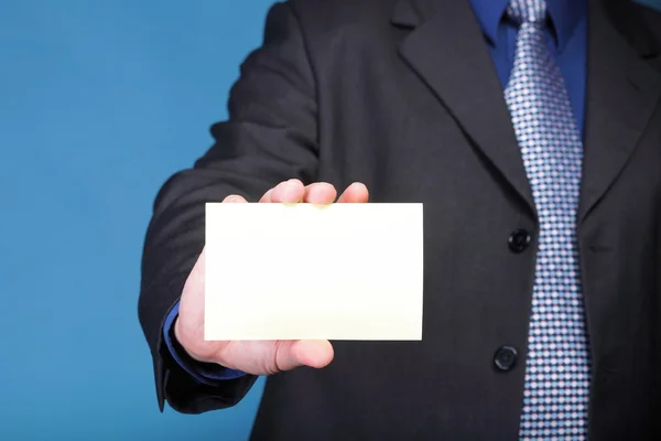 Close up of business note card in male hand — Stock Photo, Image