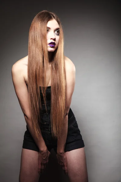 Sad unhappy girl young woman with long hair and creative makeup — Stock Photo, Image