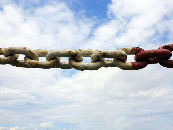 Steel metal chain links segment sky background — Stock Photo, Image