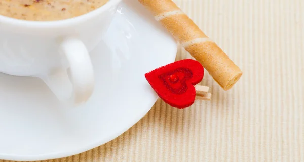 White cup coffe waffle roll with cream heart. Love valentine's day — Stock Photo, Image