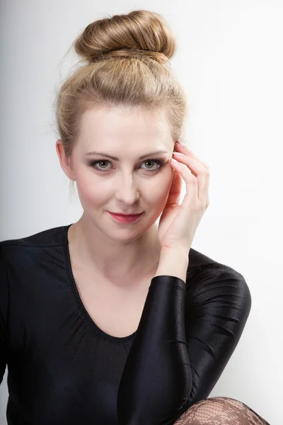 Portrait young beautiful blonde girl make up and hair bun — Stock Photo, Image