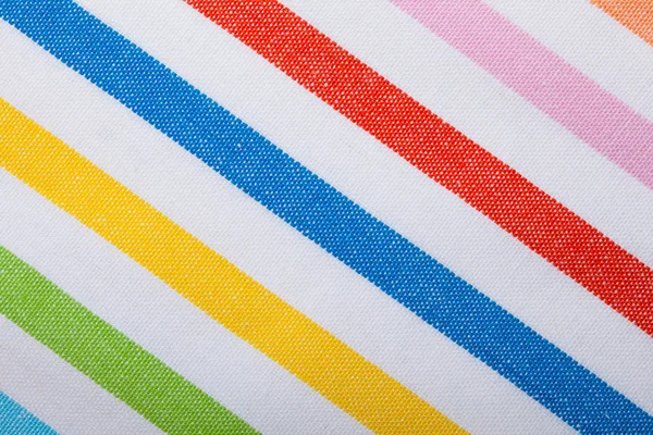 Primer plano del textil a rayas de colores como fondo o textura — Foto de Stock