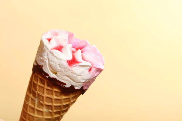Berry icecream waffle cone on orange — Stock Photo, Image