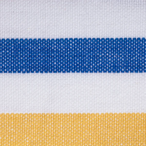 Closeup modré žluté pruhované textilu jako pozadí nebo textury — Stock fotografie