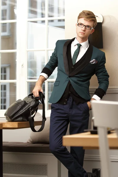 Young handsome stylish man in trendy cafe — Stock Photo, Image