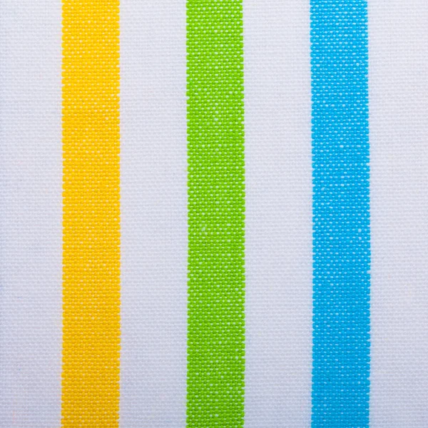 Closeup de têxteis listrados coloridos como fundo ou textura — Fotografia de Stock