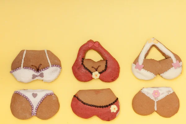 Funny bikini underwear shape gingerbread cakes cookies on yellow — Stock Photo, Image