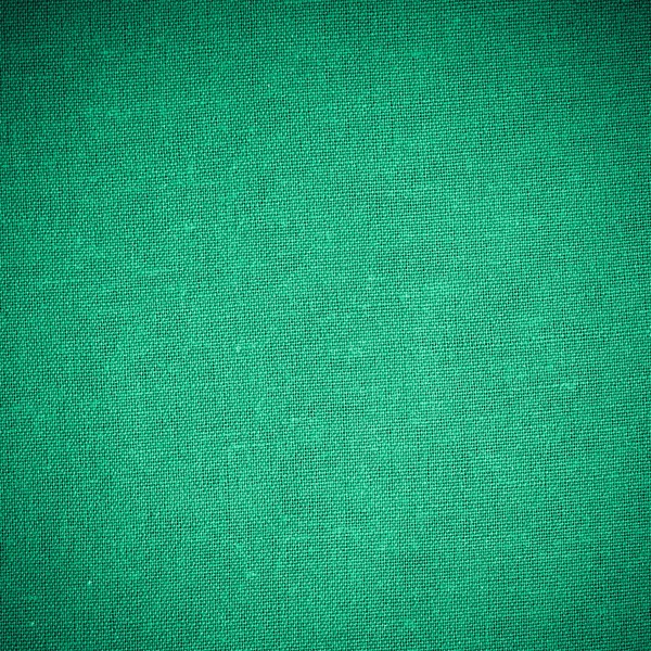 Primo piano della materia tessile del tessuto verde come trama o sfondo — Foto Stock