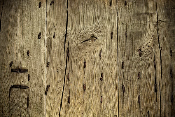 Oude houten grunge achtergrond met metalen roestige nagels — Stockfoto