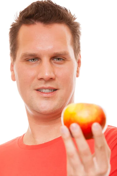 Homem feliz de camisa vermelha segurando maçã. Dieta cuidados de saúde nutrição saudável . — Fotografia de Stock