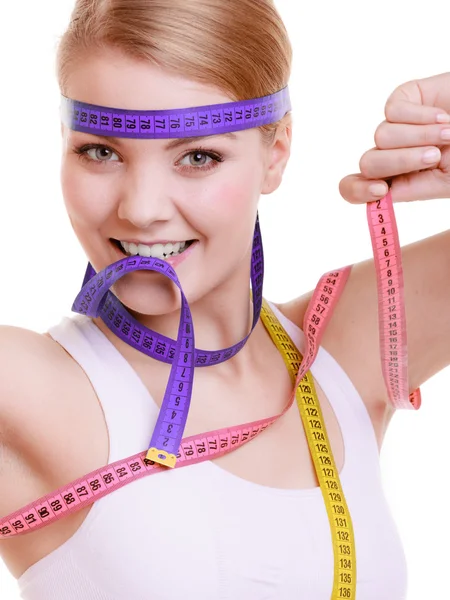 Sporty fit woman with measure tapes. Time for diet slimming. — Stock Photo, Image