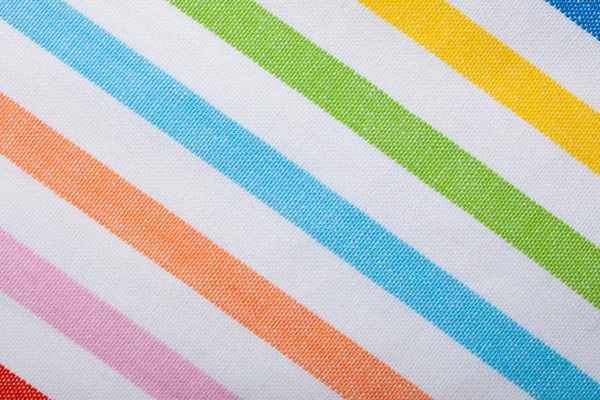 Primer plano del textil a rayas de colores como fondo o textura —  Fotos de Stock