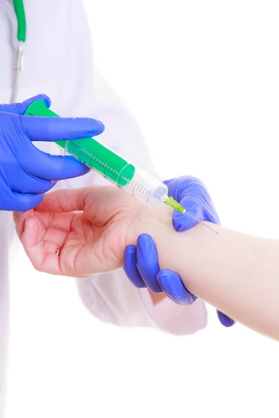 Hands of doctor nurse with syringe giving injection to patient — Stock Photo, Image