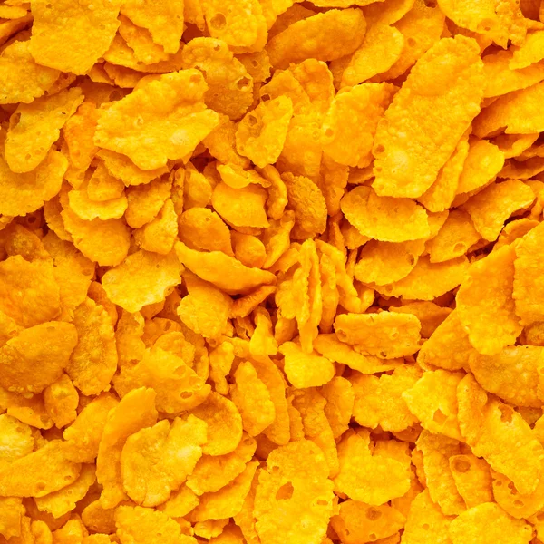 Nahaufnahme von Cornflakes Frühstück Morgenmahlzeit als Lebensmittel Hintergrund — Stockfoto