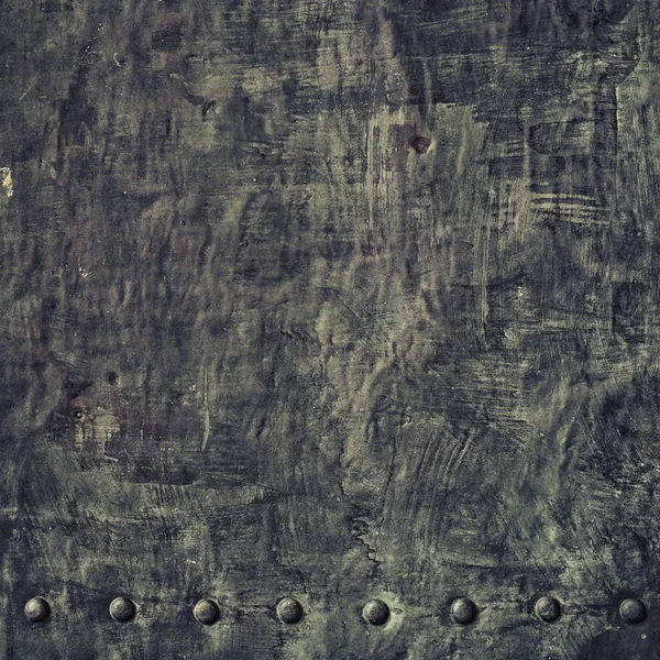 Grunge plaque métallique noire avec rivets vis texture de fond — Photo