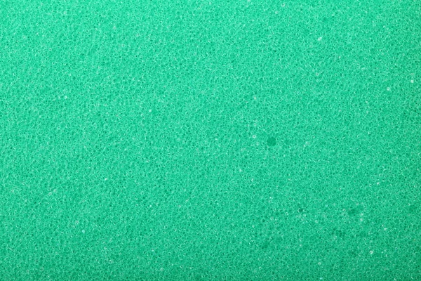 Green texture cellulose foam sponge background — Stockfoto