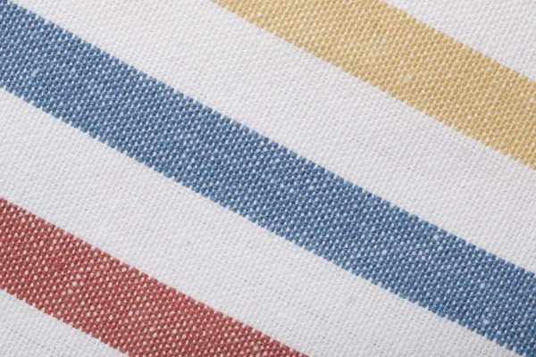 Primer plano del textil a rayas de colores como fondo o textura —  Fotos de Stock