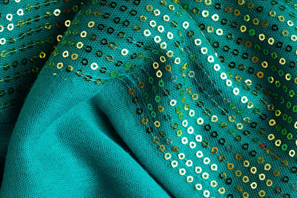 Groene sequine achtergrond textuur abstracte doek golvende plooien textiel — Stockfoto
