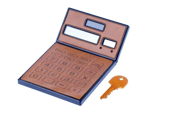 Calculator and key — Stock Photo, Image