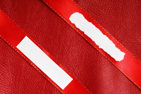 Piece scrap papers blank copy space on red ribbon leather background — Stock Photo, Image