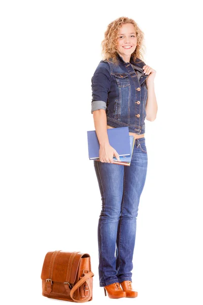 Moda jeans. Menina estudante de comprimento total em livros de bolsa de jeans azul — Fotografia de Stock