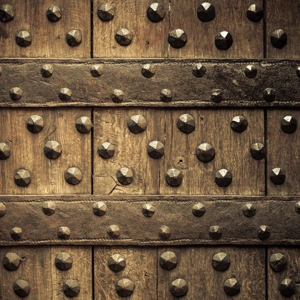 Fundo de madeira velha com rebites de metal — Fotografia de Stock