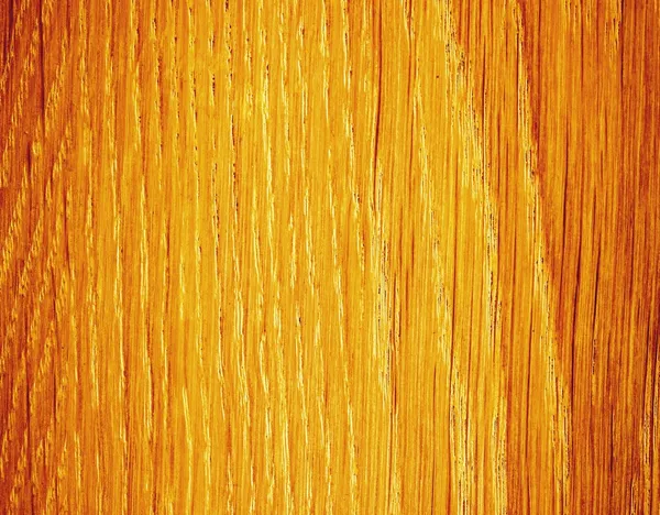 Nahaufnahme aus Holz. Orange Holzplanke als Hintergrundstruktur. — Stockfoto
