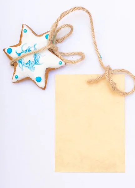 Weihnachten Lebkuchenstern mit Zuckerguss und Dekoration und Blanko-Karte — Stockfoto