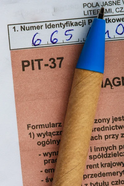 Filling in polish individual tax form PIT-37 for year 2013 — Stock Photo, Image