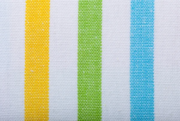 Primer plano del textil a rayas de colores como fondo o textura —  Fotos de Stock