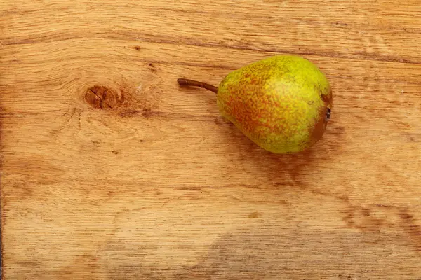 Pear fruit on wooden table background — Stock Photo, Image