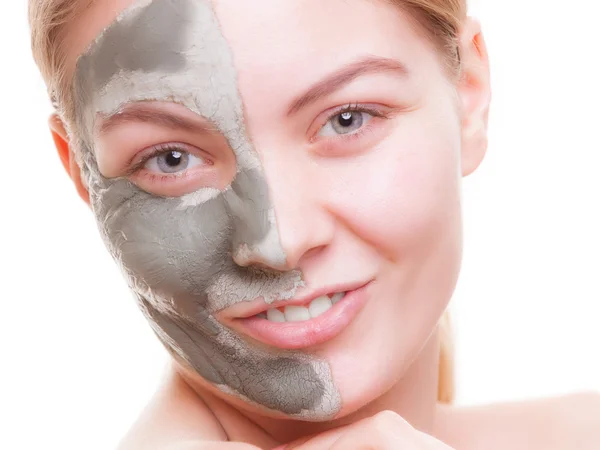 Skin care. Woman applying clay mask on face. Spa. — Stock Photo, Image