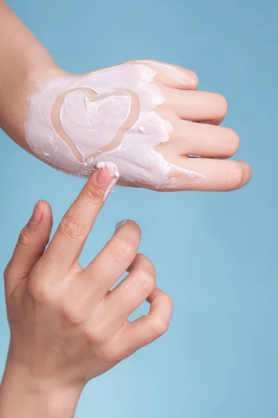 Skin care. Female palms with moisturizing cream. — Stock Photo, Image