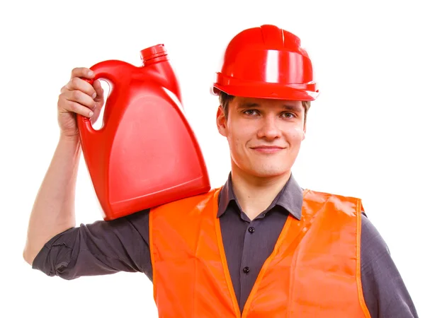 Man worker in safety vest and hard hat with canisters — Stock Photo, Image