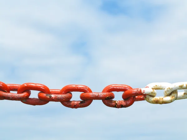 Steel metal chain links segment sky background — Stock Photo, Image