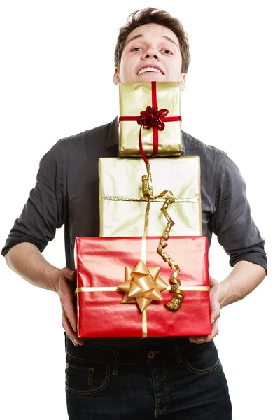 Holiday. Young man giving presents gifts boxes — Stock Photo, Image