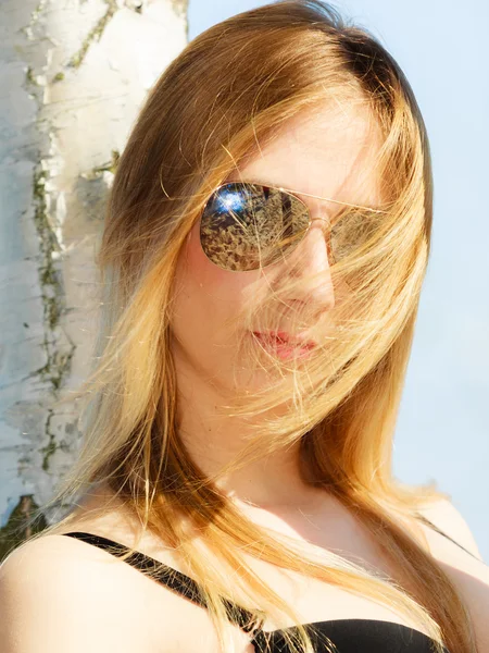 Summer vacation. Girl in bikini standing on beach — Stock Photo, Image