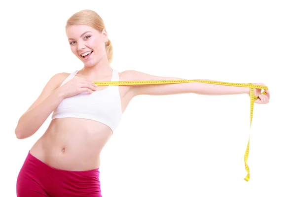 Dieta. Fitness donna in forma ragazza con nastro di misura isolato — Foto Stock