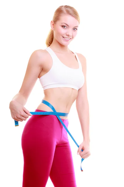 Dieet. Fitness vrouw passen meisje met maatregel tape meten haar taille — Stockfoto