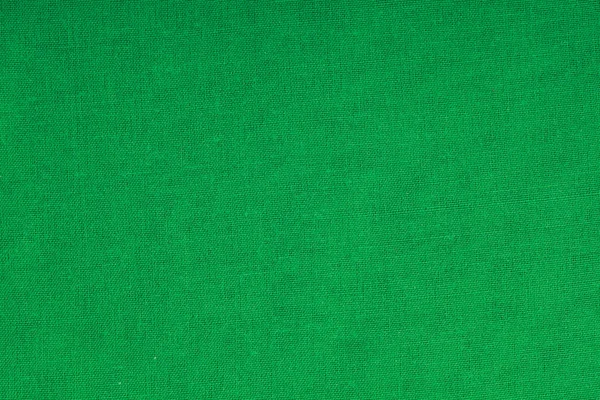 Primo piano della materia tessile del tessuto verde come trama o sfondo — Foto Stock