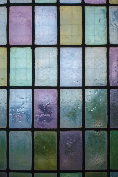 Цветные витражи окна с регулярным рисунком блока синий зеленый тон — стоковое фото