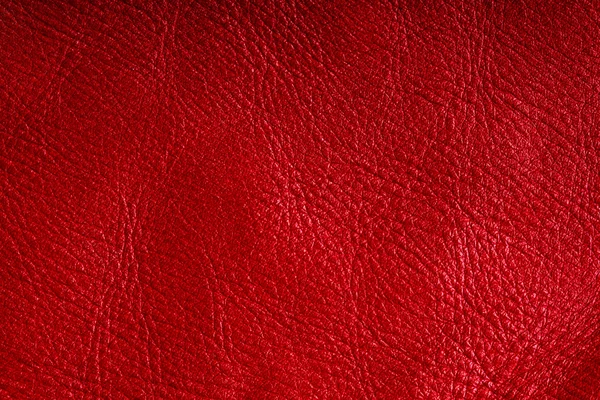 Red textured leather grunge background closeup — Stock Photo, Image