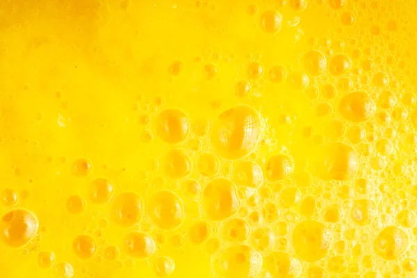 Alimentation saine. Jus de fruits jaunes frais texture de fond — Photo