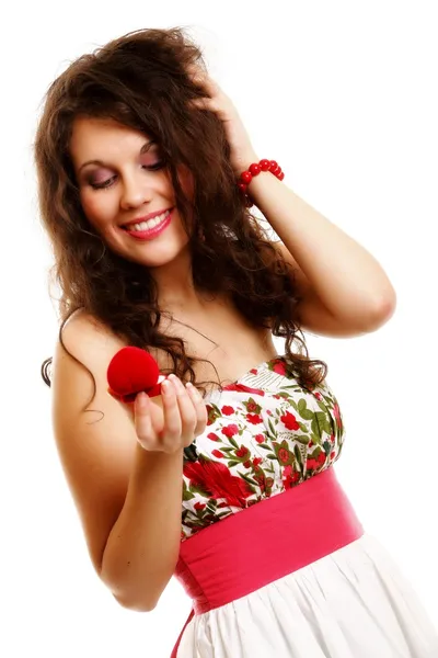 Woman holding a present with engagement ring — Stock Photo, Image