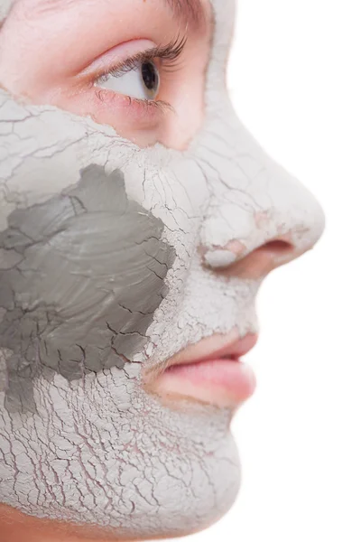 Skin care. Woman applying clay mask on face. Spa. — Stock Photo, Image