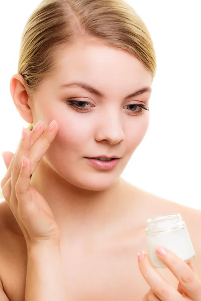Skin care. Girl applying moisturizing cream. — Stock Photo, Image