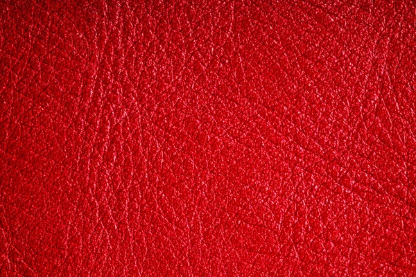 Red textured leather grunge background closeup — Stock Photo, Image