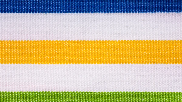 Primer plano del textil a rayas de colores como fondo o textura — Foto de Stock